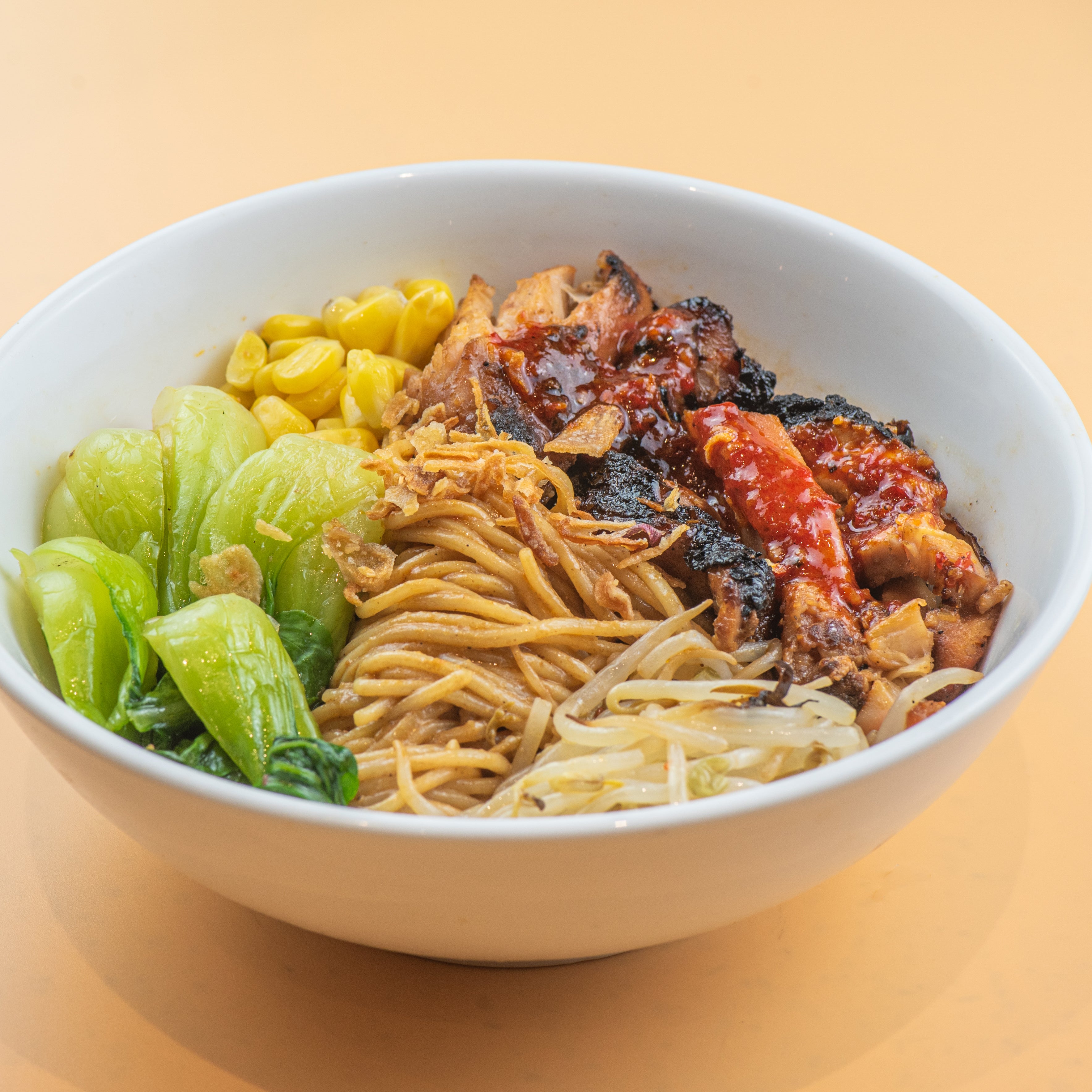 spicy sesame noodles with cantonese bbq chicken from Junzi Kitchen Virginia Tech